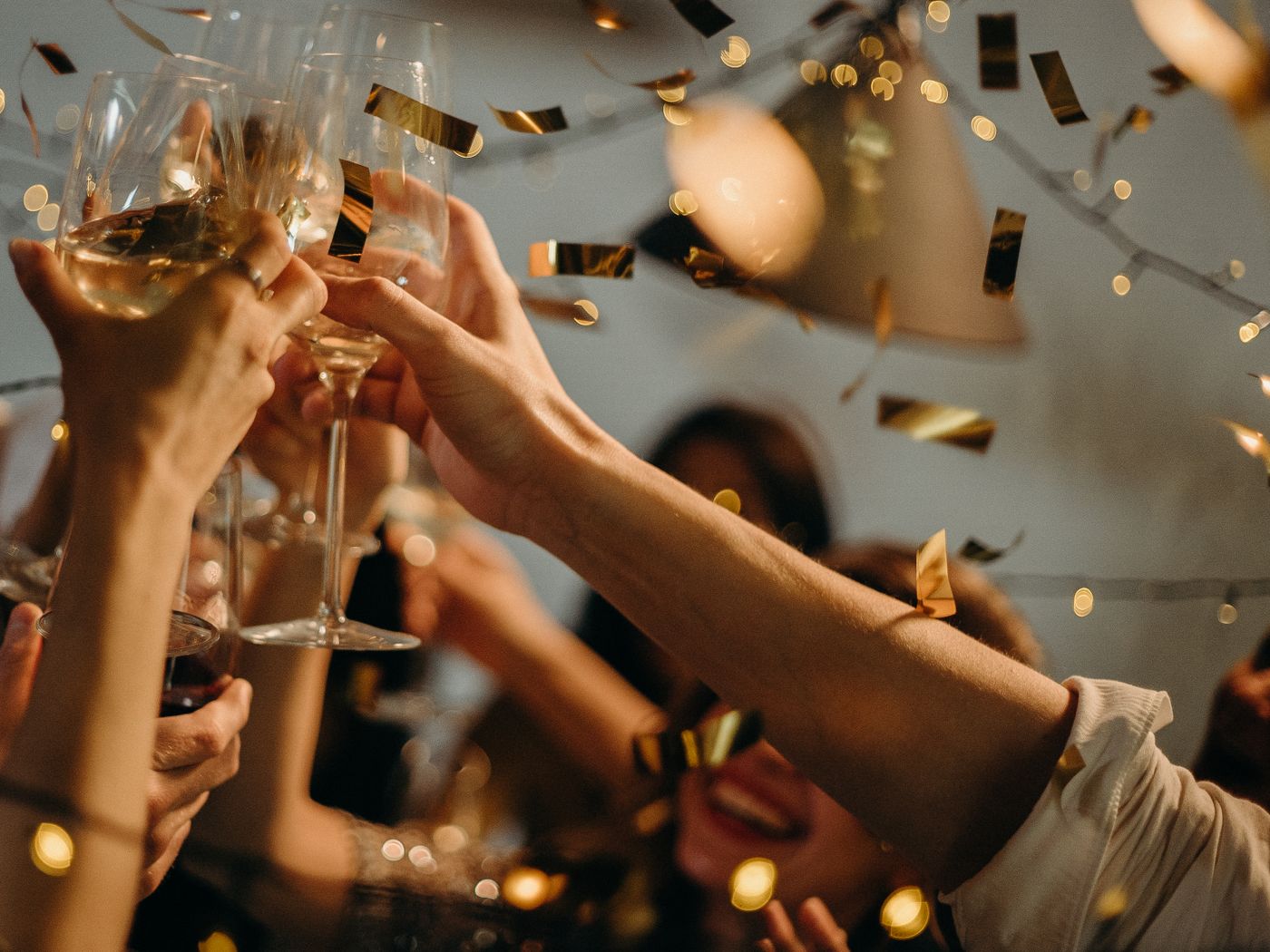 Glasses raised at a community celebration