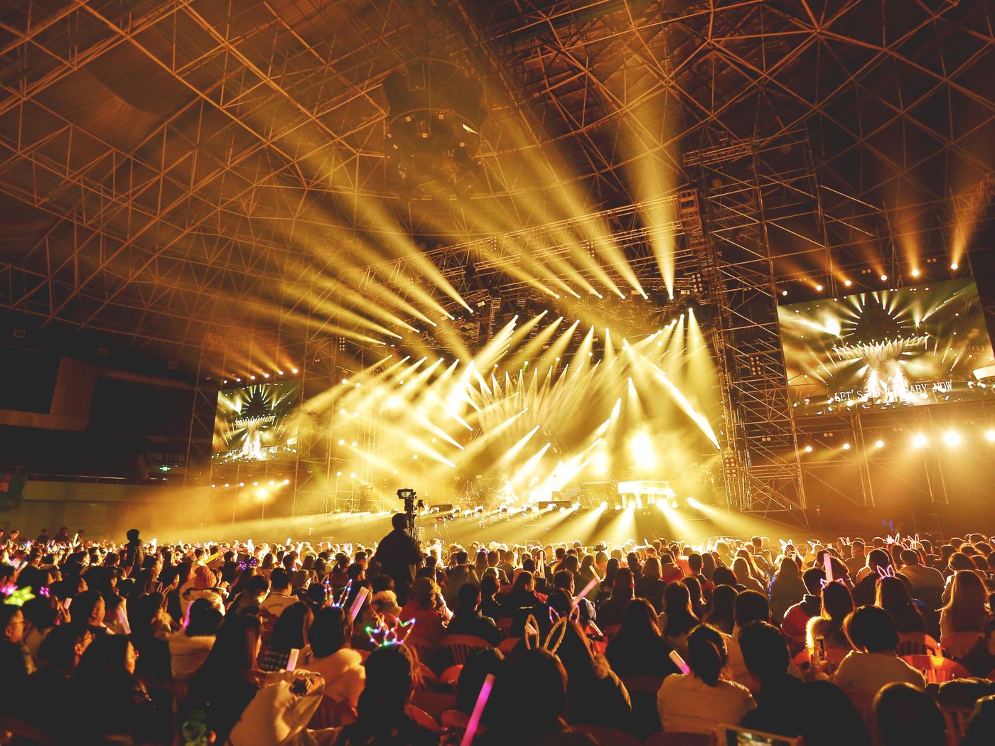 A festival main stage at night
